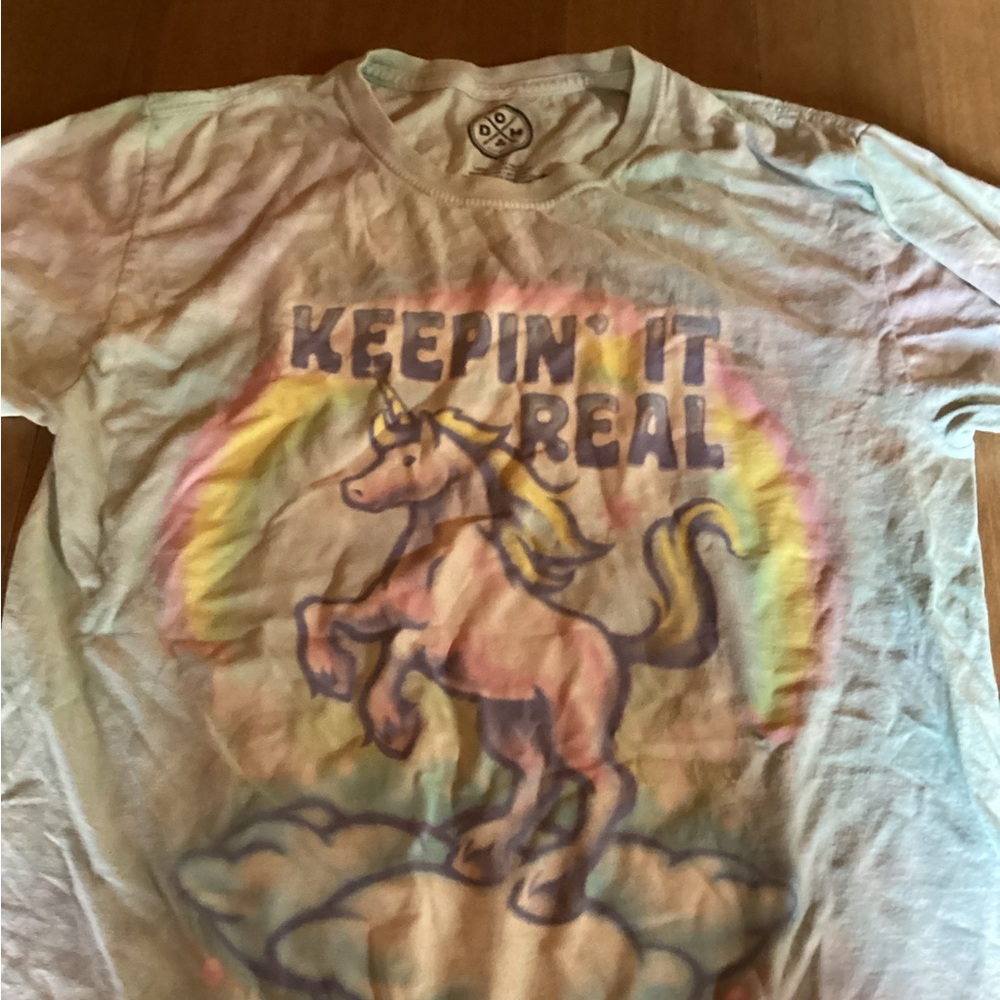 Keeping it real with unicorn. Woman’s small. DOM brand, good used condition.